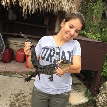Coopertown Restaurant - Holding the baby aligator (2 yrs old-female) - Breakfast & Brunch Near Me - Miami, Florida