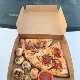 Margherita pizza and garlic knots Margherita pizza and garlic knots