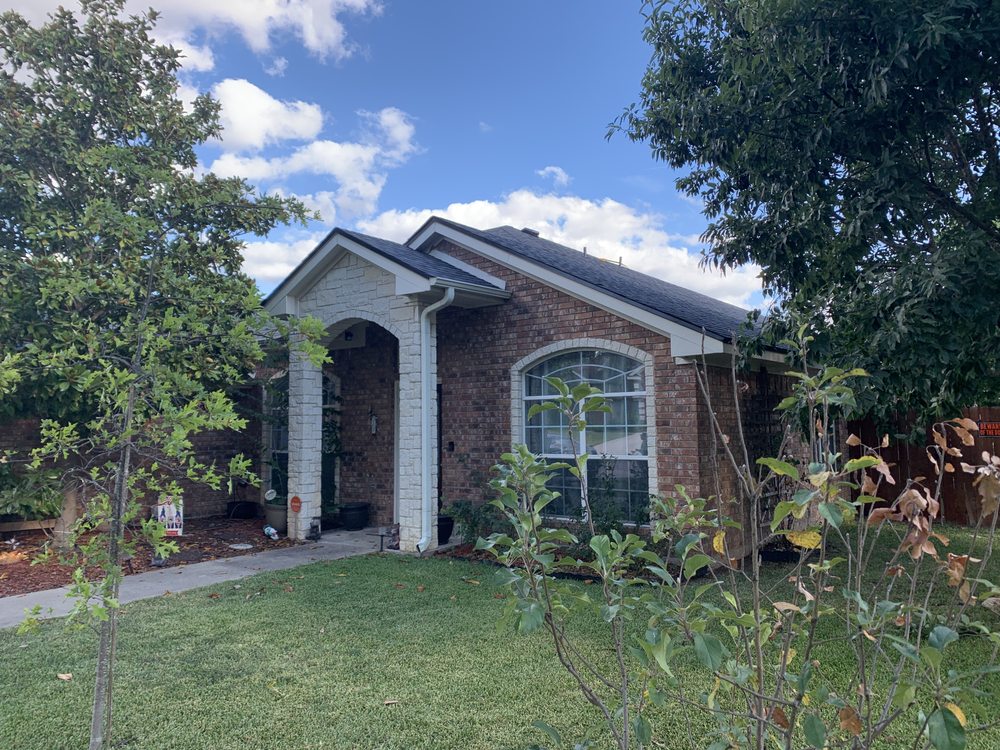 Slide of Top Notch Roofing