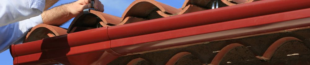 Slide of Water-Tech Seamless Gutters and Gutter Guards