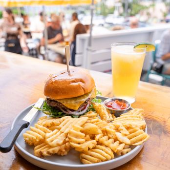 Cove House - Cove House Burger with Waffle Fries and a Spicoli. - New American Near Me - La Jolla, California Cove House - Cove House Burger with Waffle Fries and a Spicoli. - New American Near Me - La Jolla, California