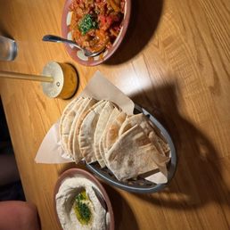 Hummus and Moroccan eggplant, and some emaciated pitas Hummus and Moroccan eggplant, and some emaciated pitas