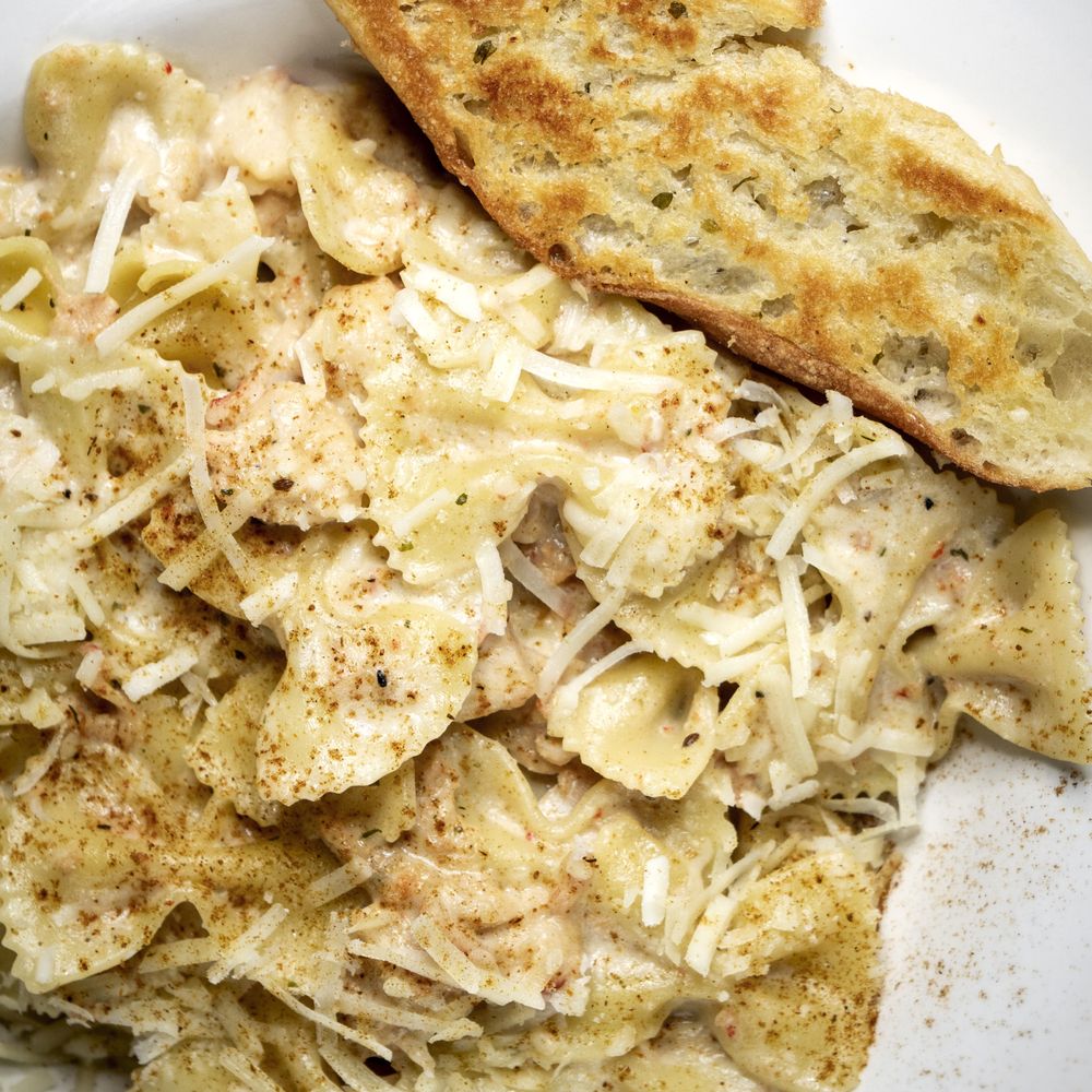 The Waltzing Weasel - a plate of pasta and bread - Pubs Near Me - Oshawa, Ontario The Waltzing Weasel - a plate of pasta and bread - Pubs Near Me - Oshawa, Ontario