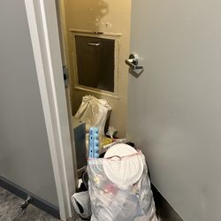 Place One Condominiums - It smells ungodly. Weekly occurrence as of late. When you open the door, it's filled with trash so people have resorted to this.