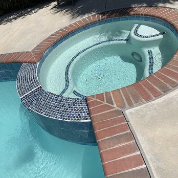 Sanchez Pool Construction - Final replastered & retiled jacuzzi with seating tile trim - Pool & Hot Tub Service Near Me