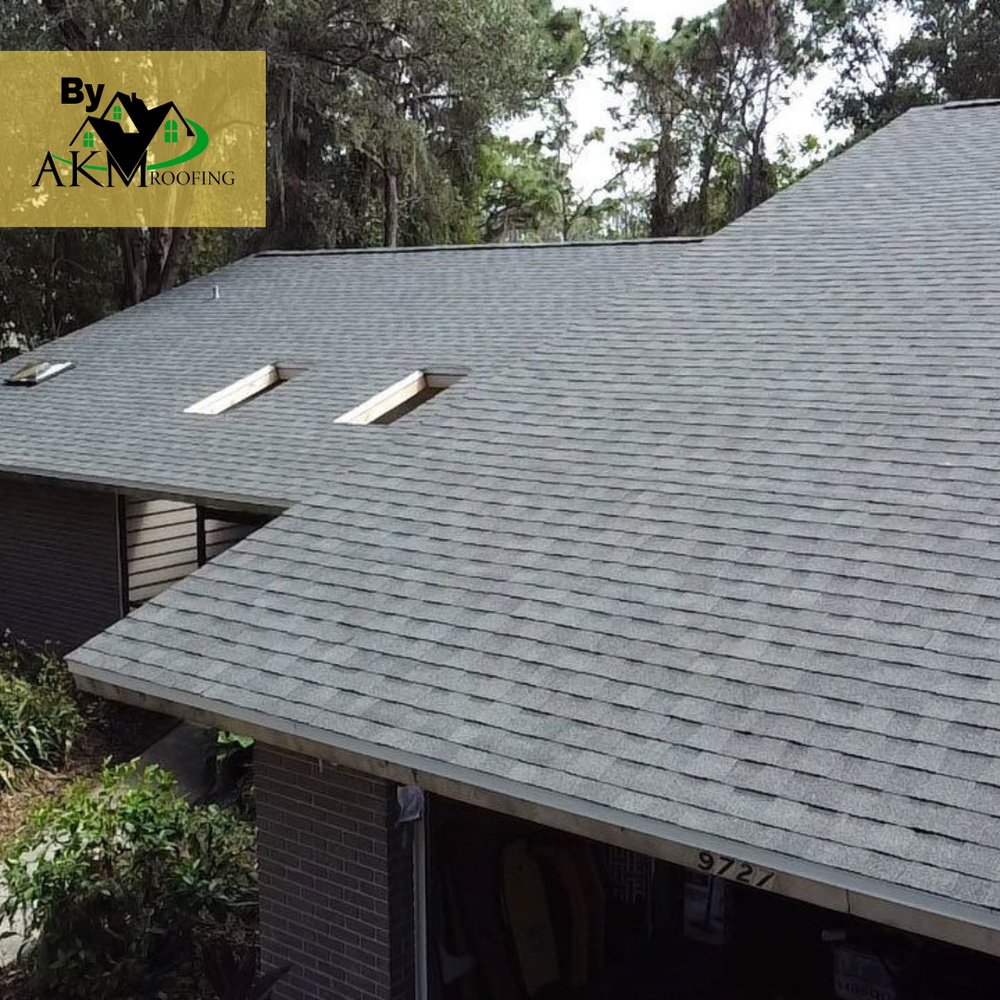 Slide of AKM Roofing
