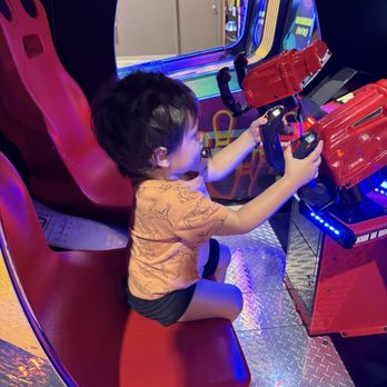 Big Air Houston - My toddler pretending to play an arcade game. - Trampoline Parks Near Me - Houston, Texas Big Air Houston - My toddler pretending to play an arcade game. - Trampoline Parks Near Me - Houston, Texas