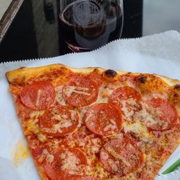 Pepperoni slice and sooooo good! Less than $11 for my slice and glass of delicious Italian red! Pepperoni slice and sooooo good! Less than $11 for my slice and glass of delicious Italian red!