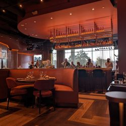 Aris Steakhouse - Exceptional design. Tables, booths and bar seating.