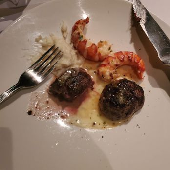 The Capital Grille - Close up of seared tenderloin and lobster tail - Steakhouses Near Me - Chevy Chase, Maryland The Capital Grille - Close up of seared tenderloin and lobster tail - Steakhouses Near Me - Chevy Chase, Maryland