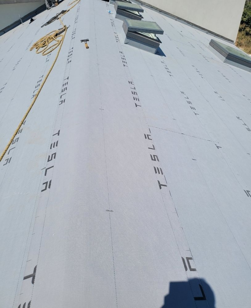 Slide of Alma Roofing