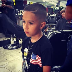 Profilez Barber Shop - My oldest son thinks he's too cool to smile but I guess he look it! Lol thanks jay!