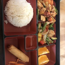 Lunch box with tofu with cashew sauce and tofu with basil sauce. Also comes with miso soup.