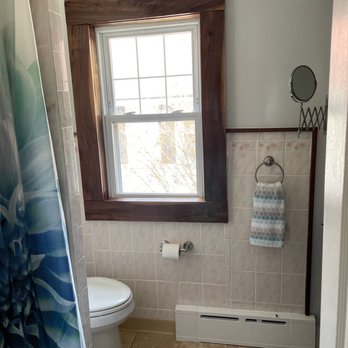 Matt Dombroski The Perfect Handyman - Trim around the bathroom window replaced with black walnut - Handyman Near Me Matt Dombroski The Perfect Handyman - Trim around the bathroom window replaced with black walnut - Handyman Near Me