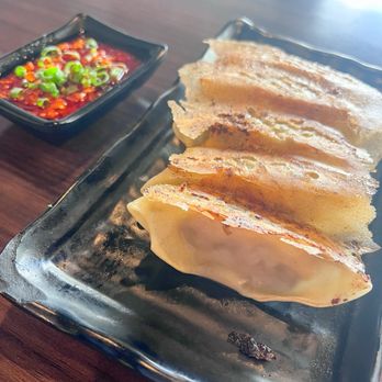 Noods Ramen Bar - Garlic chili gyoza (with the garlic chili oil on the side) - Ramen Near Me - Honolulu, Hawaii Noods Ramen Bar - Garlic chili gyoza (with the garlic chili oil on the side) - Ramen Near Me - Honolulu, Hawaii