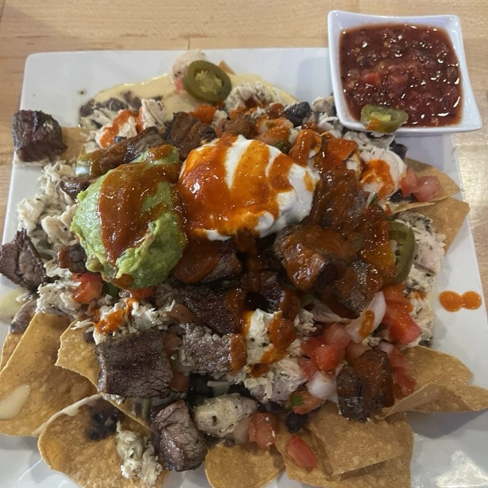 Gopher's Grill - 1/2 order of nachos with steak and chicken. A meal just by itself. - Bars Near Me - Effingham, Illinois Gopher's Grill - 1/2 order of nachos with steak and chicken. A meal just by itself. - Bars Near Me - Effingham, Illinois