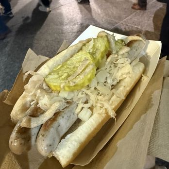 Christkindlmarket Chicago - Bratwurst with sauerkraut and pickles - Festivals Near Me - Chicago, Illinois Christkindlmarket Chicago - Bratwurst with sauerkraut and pickles - Festivals Near Me - Chicago, Illinois