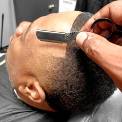 Crowns Cutz Studio - The razor edge up with advance enhancement.