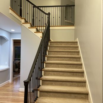 Eagle Home Painting - a staircase leading to a second floor - Painters Near Me Eagle Home Painting - a staircase leading to a second floor - Painters Near Me