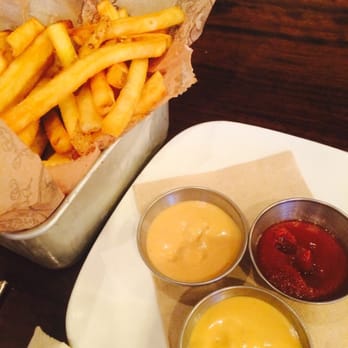Bareburger - Bayside - Fresh fries, with spicy mayo, curry ketchup and special sauce. - Burgers Near Me - New York, New York Bareburger - Bayside - Fresh fries, with spicy mayo, curry ketchup and special sauce. - Burgers Near Me - New York, New York