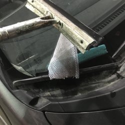 Conoco - The only squeegee these cheap fucks have fell apart into four pieces when I tried to use it.
