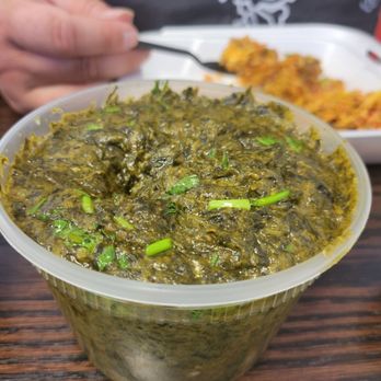 Himalayan Indian Kitchen - Saag Paneer...once you scoop in, you'll find the cubes of cheese. - Indian Near Me - Apple Valley, California