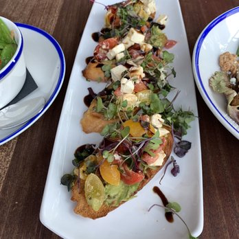 STIRR - Avocado caprese crostini - Cocktail Bars Near Me - Dallas, Texas STIRR - Avocado caprese crostini - Cocktail Bars Near Me - Dallas, Texas
