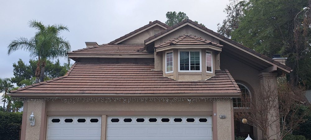 Slide of Aloha Bros Roof Cleaning