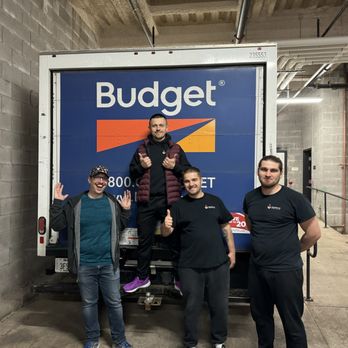 Move4U - Photo of 4 adults standing in front of a closed moving truck. - Movers Near Me - Chicago, Illinois