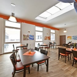 Orange Hotel und Apartments - Restaurant