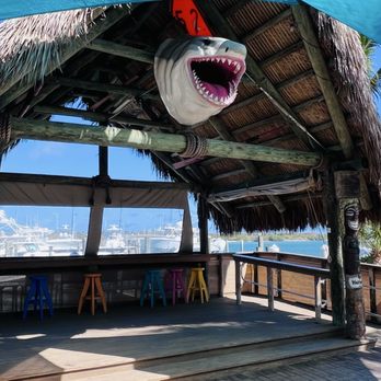 Tiki 52 - Stage area with interesting shark head at top - Tiki Bars Near Me - Tequesta, Florida Tiki 52 - Stage area with interesting shark head at top - Tiki Bars Near Me - Tequesta, Florida