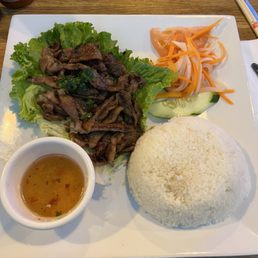Grill sliced pork on rice