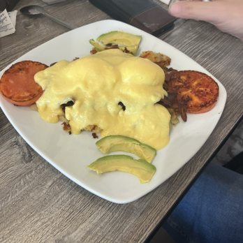 Funny Mugs Bistro - Egg Benedict with hollandaise sauce. - Breakfast & Brunch Near Me - Port Richey, Florida Funny Mugs Bistro - Egg Benedict with hollandaise sauce. - Breakfast & Brunch Near Me - Port Richey, Florida