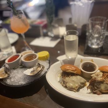The Prime Rib - a plate of food and a glass of water - Steakhouses Near Me - Philadelphia, Pennsylvania The Prime Rib - a plate of food and a glass of water - Steakhouses Near Me - Philadelphia, Pennsylvania