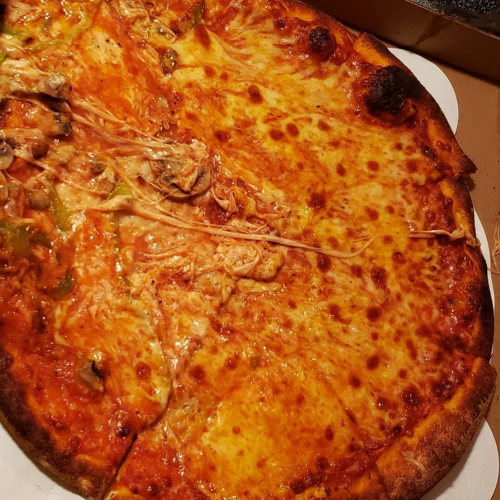 a cheese pizza in a box a cheese pizza in a box