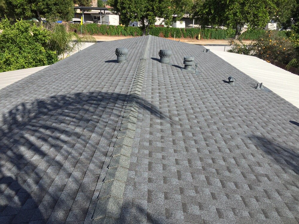 Slide of E & E Roofing