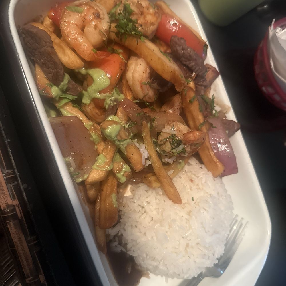 Imperio Peruvian Cuisine - Mix de Saldado Pollo, Res y Camarón - Peruvian Near Me