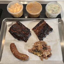 Ribs a la carte, space dog, pulled pork a la carte and 3 large sides