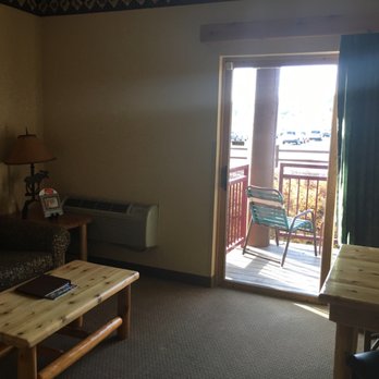 Great Wolf Lodge - Living room area with a private deck - Resorts Near Me - Traverse City, Michigan