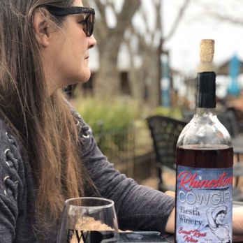 Fiesta Winery Main Street - Listening to music - hubby took pic - Wine Tasting Room Near Me - Fredericksburg, Texas