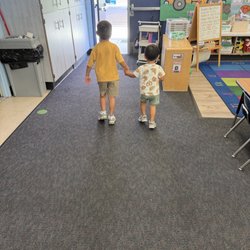 Big brother guiding little brother in such a caring environment!
