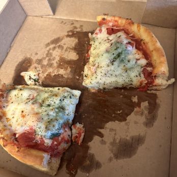 Chicago Dough Company - a half eaten pizza in a box - Pizza Near Me - Bourbonnais, Illinois Chicago Dough Company - a half eaten pizza in a box - Pizza Near Me - Bourbonnais, Illinois