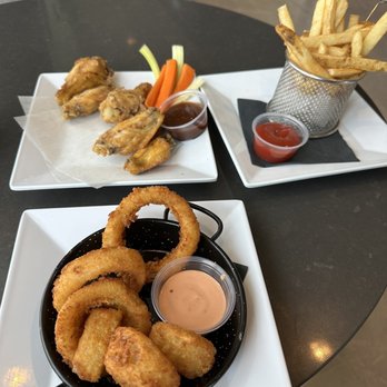 Bar C Lona Rooftop - Wings (crispy), fries and onion rings - French Near Me - San Juan, Puerto Rico Bar C Lona Rooftop - Wings (crispy), fries and onion rings - French Near Me - San Juan, Puerto Rico