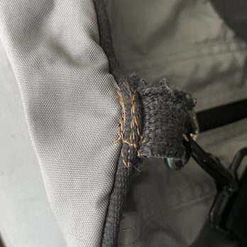 Allas Tailor - Black strap repair with brown thread - Sewing & Alterations Near Me - Kansas City, Missouri Allas Tailor - Black strap repair with brown thread - Sewing & Alterations Near Me - Kansas City, Missouri