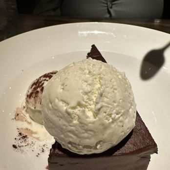 Cooper’s Hawk Winery & Restaurant - Delicious Cooper's Hawk Chocolate Cake with vanilla ice cream - Wine Bars Near Me - Middleton, Wisconsin