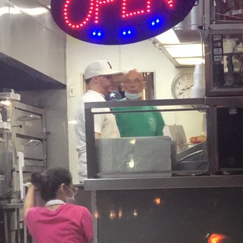 Joes Pizza Pasta & Subs - Staff members with no gloves or masks handling food. - Italian Near Me - Carrollton, Texas