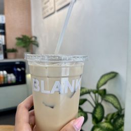 Iced Vanilla Latte with oat milk Iced Vanilla Latte with oat milk