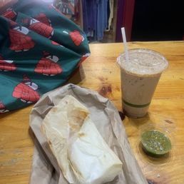 Sausage breakfast burrito, iced salted maple latte Sausage breakfast burrito, iced salted maple latte