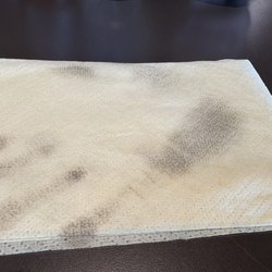 Pizza Hut - First pic is from the table we wiped off, flies all over the windows and the floor. Where is the health department?