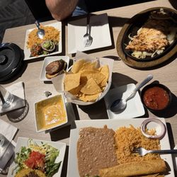 Chicken fajitas (goooood tortillas) , chicken flautas, crispy beef taco, Queso, chips and salsa